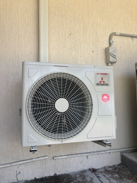 Mitsubishi split-system outdoor condenser unit installed in Yamba