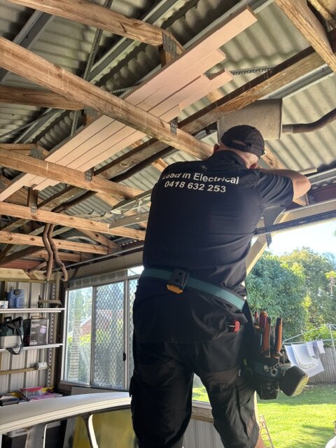 Running new electrical cabling through a ceiling cavity during a rewire